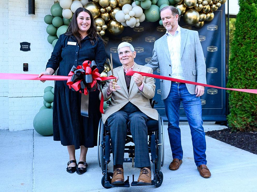 Taylor ribbon cutting